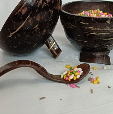Coconut shell container with spoon for sweets and Mouthfreshners. Coconut shell lid with brass detailing
